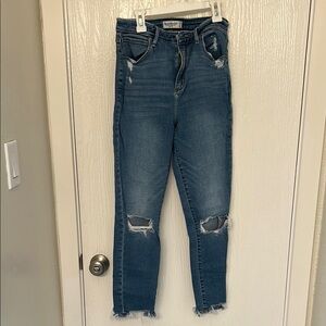 Women's Distressed Blue Jeans